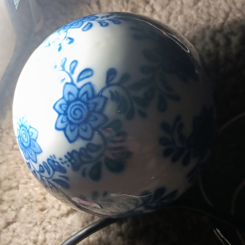 chinese glass ornamental ball, about 4 inches wide. white and blue